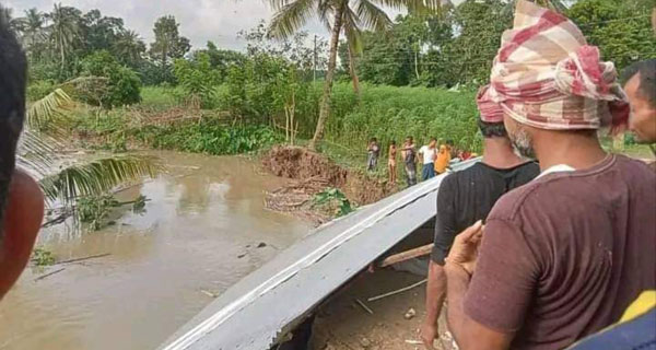 মাদারীপুরে আড়িয়াল খাঁ নদী গর্ভে বিলিন বসতবাড়ি ও ফসলি জমি